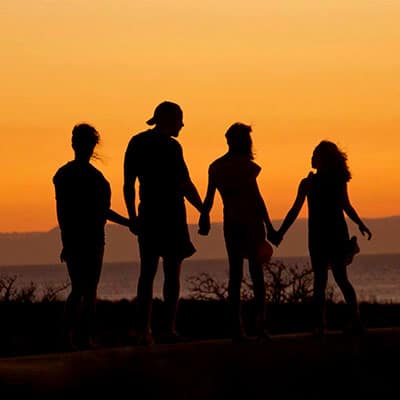 Family silhouette in the sunset